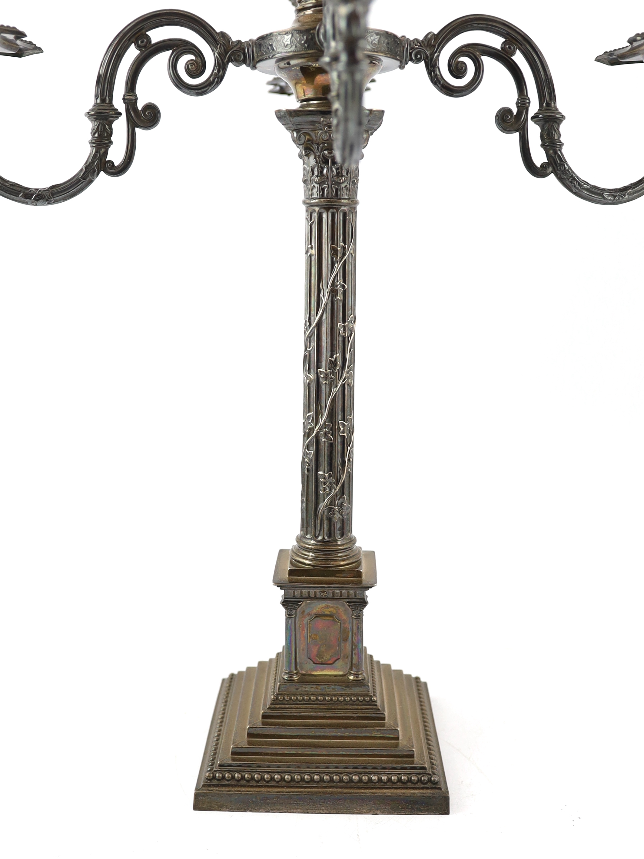 An Edwardian silver four branch, five light Corinthian column candelabrum, by James Deakin & Sons